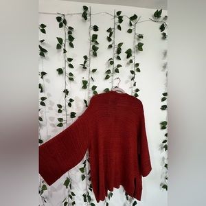 this is very nice old navy cardigan in orange perfect for the fall, size M.